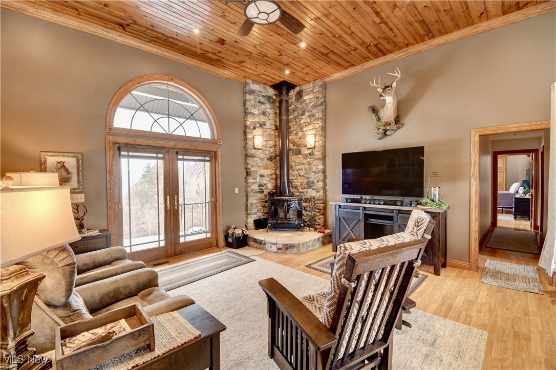85553 Beagle Clb Road Scio, OH 43988 - Photo 13 of 50 Living area with ornamental molding, french doors, light wood-style flooring, and wood ceiling