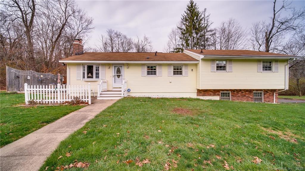 1692 Country Club Road Middletown, CT 06457 - Photo 1 of 1 a front view of a house with a garden