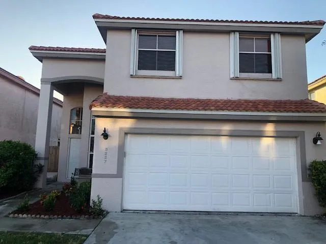 a house view with a outdoor space