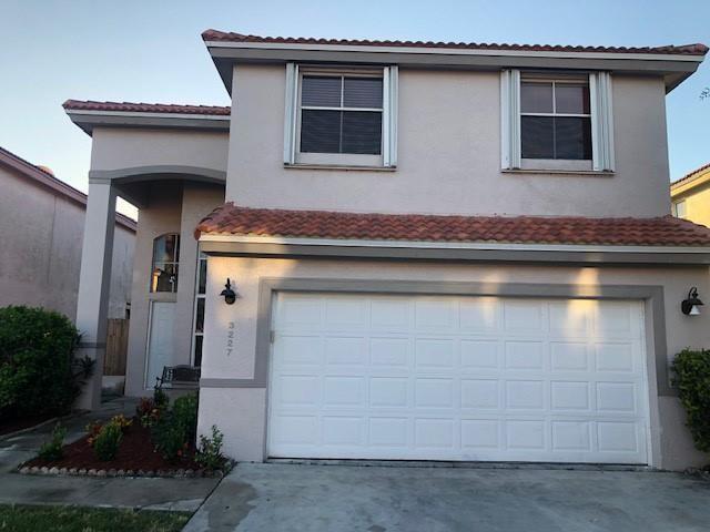 a house view with a outdoor space