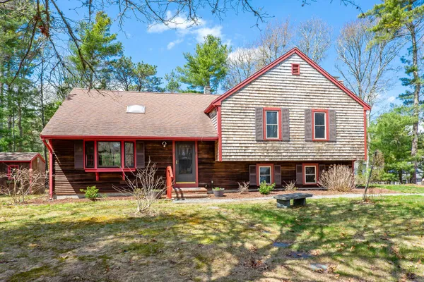 front view of a house with a yard