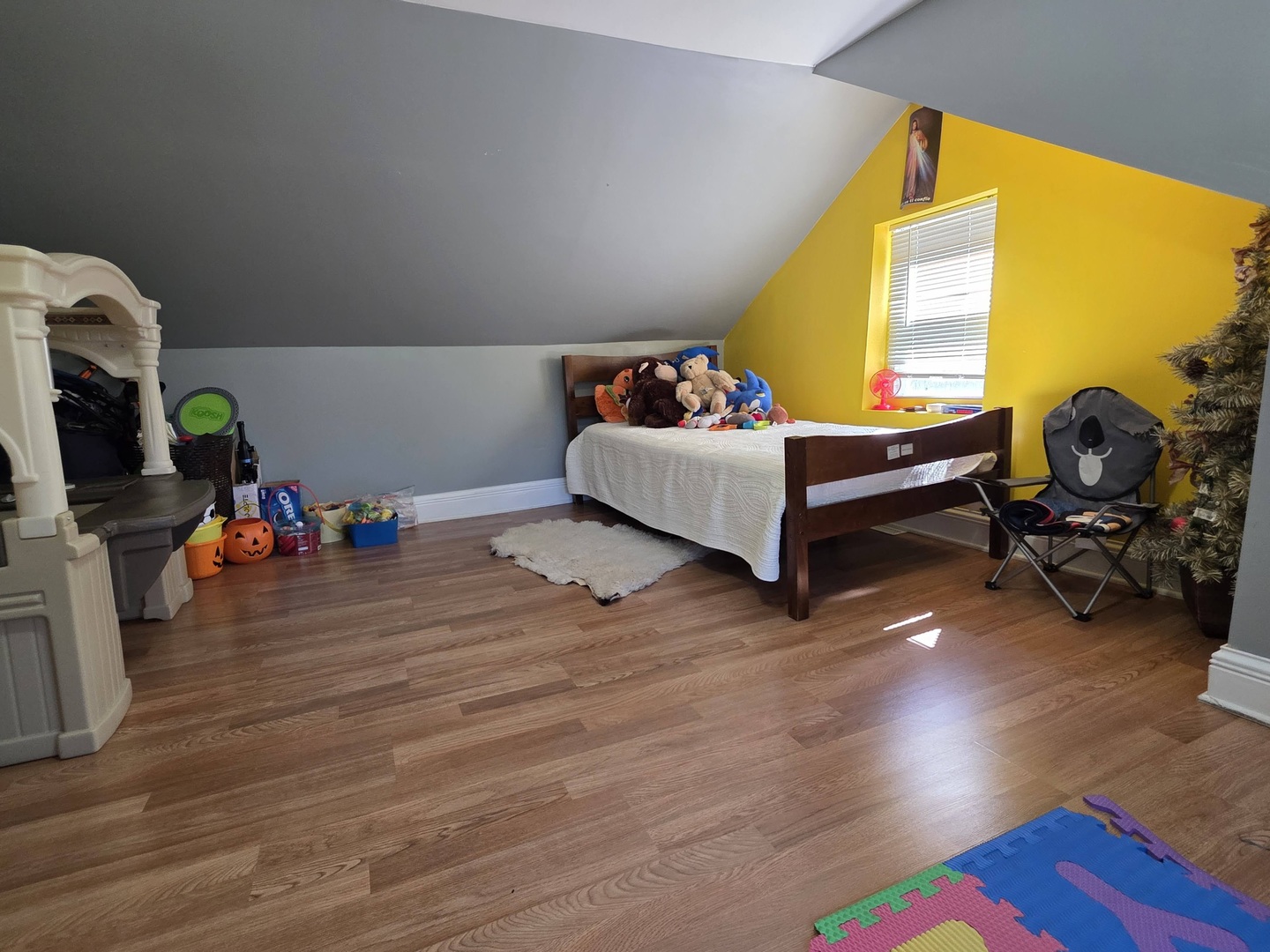 38433 North 5th Avenue Spring Grove, IL 60081 - Photo 29 of 44 a bedroom with furniture and a wooden floor
