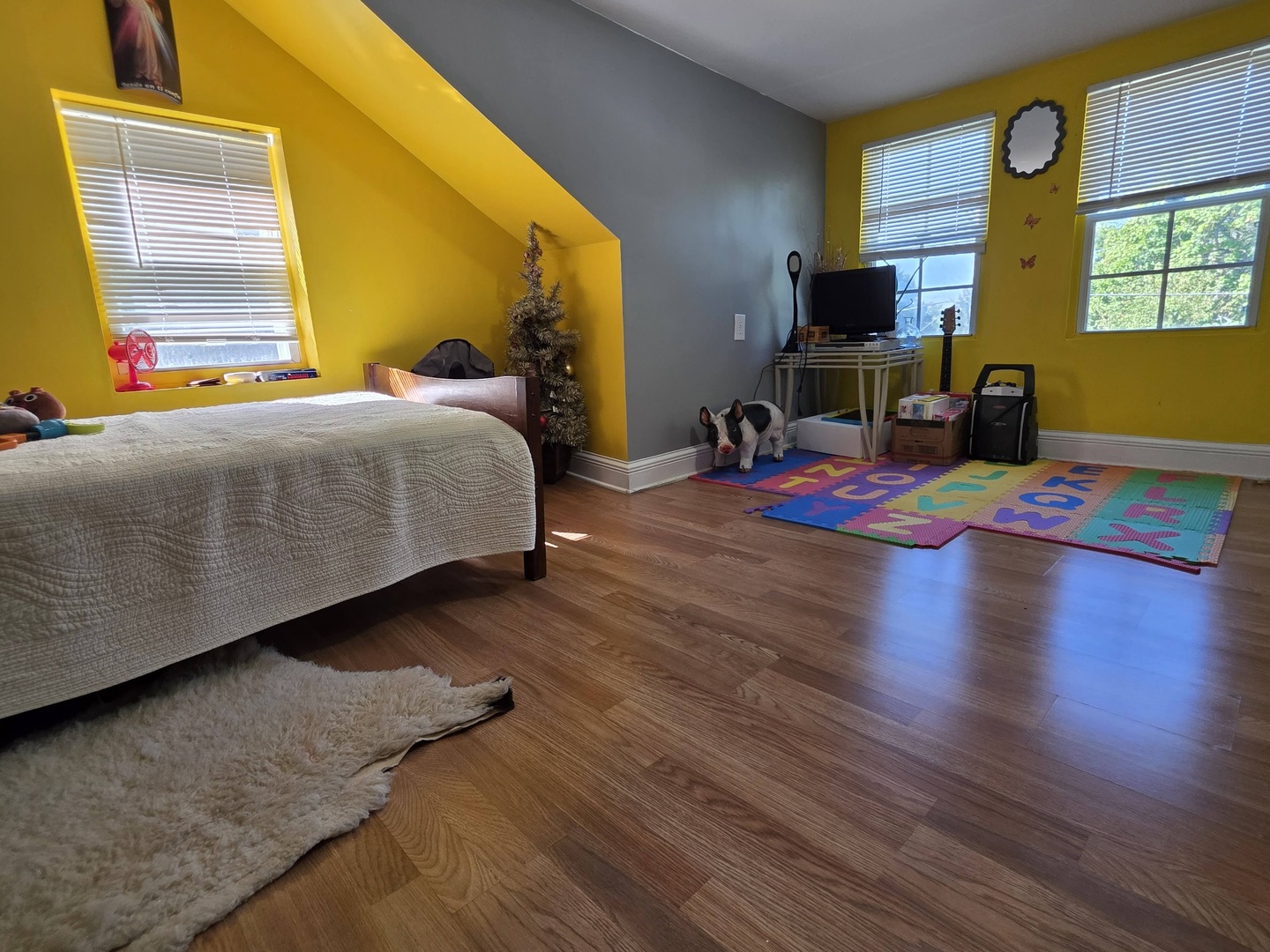 38433 North 5th Avenue Spring Grove, IL 60081 - Photo 30 of 44 a bedroom with a bed and wooden floor