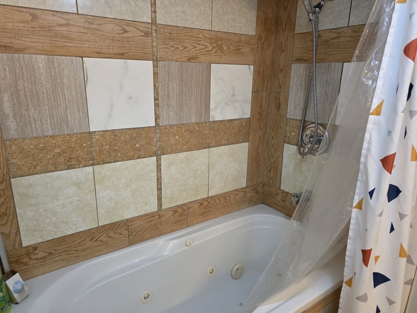 38433 North 5th Avenue Spring Grove, IL 60081 - Photo 32 of 44 a bathroom with a bathtub and shower