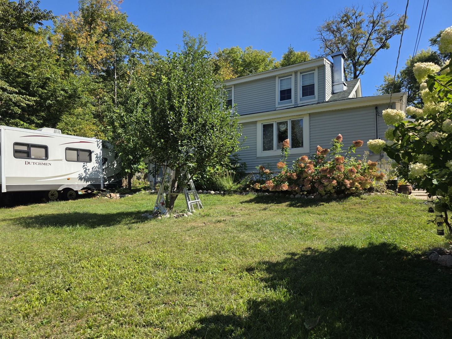 38433 North 5th Avenue Spring Grove, IL 60081 - Photo 36 of 44 a front view of a house with garden