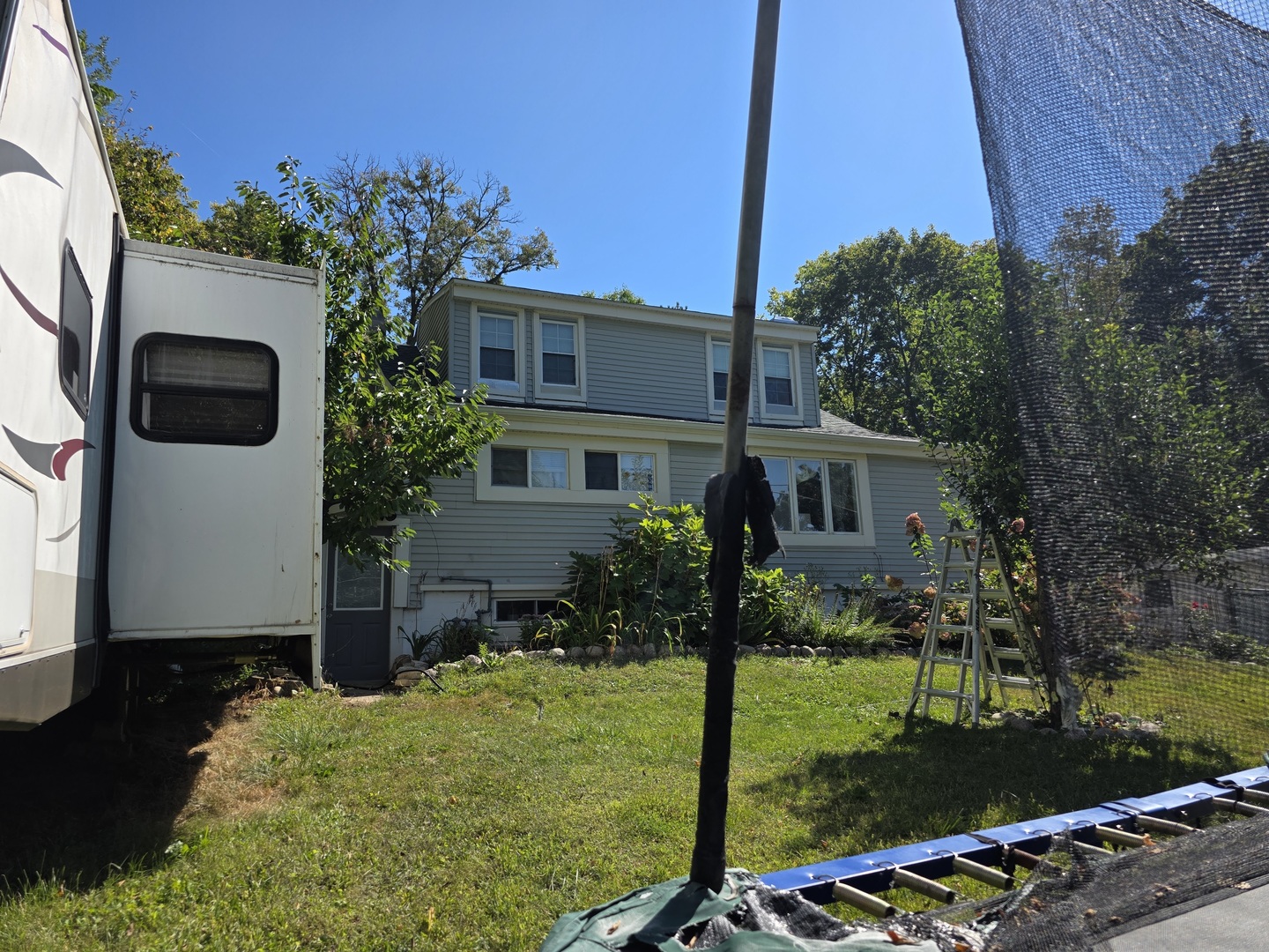 38433 North 5th Avenue Spring Grove, IL 60081 - Photo 38 of 44 a front view of a house with garden