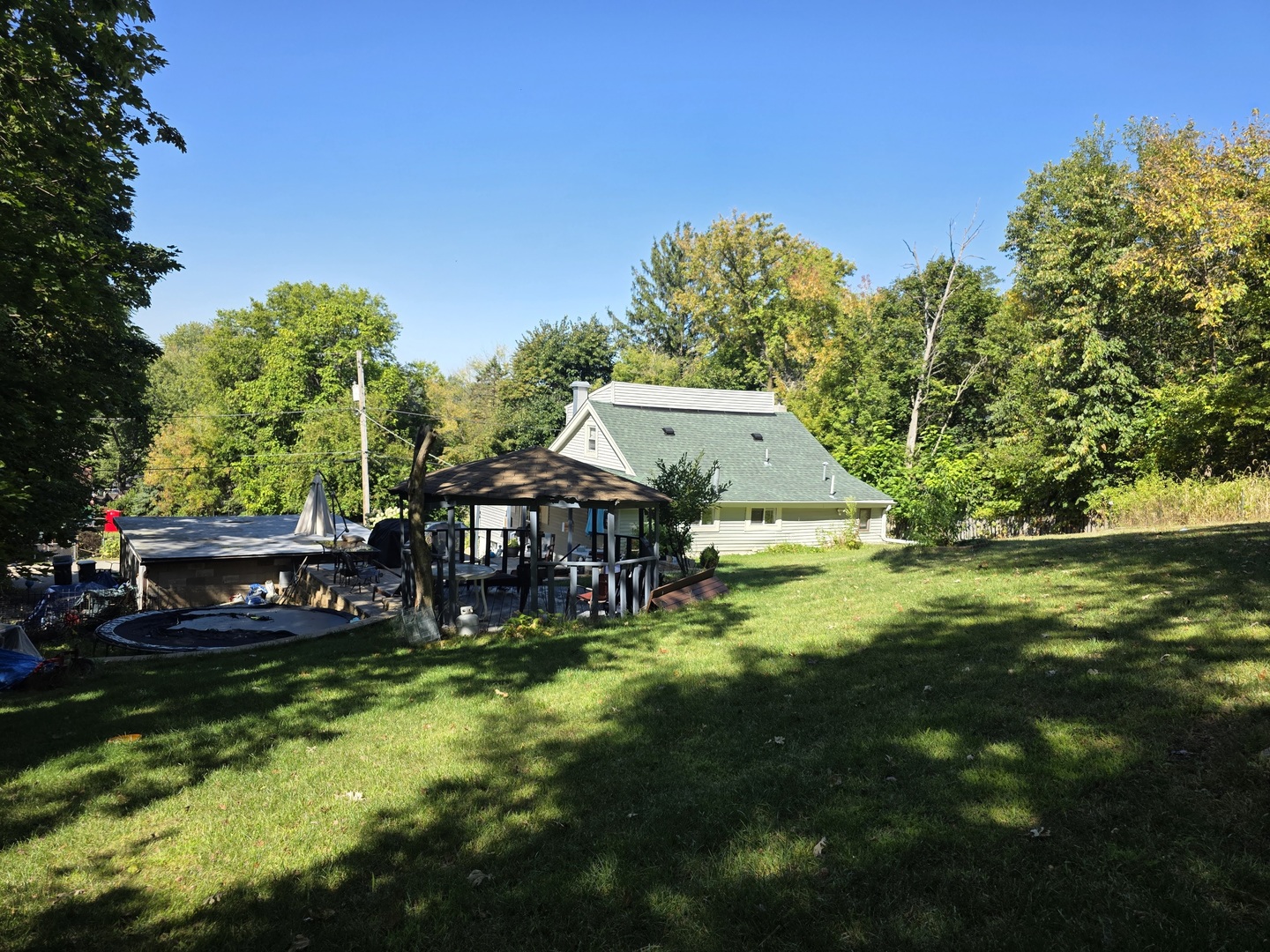 38433 North 5th Avenue Spring Grove, IL 60081 - Photo 41 of 44 a view of a house with a yard porch and sitting area