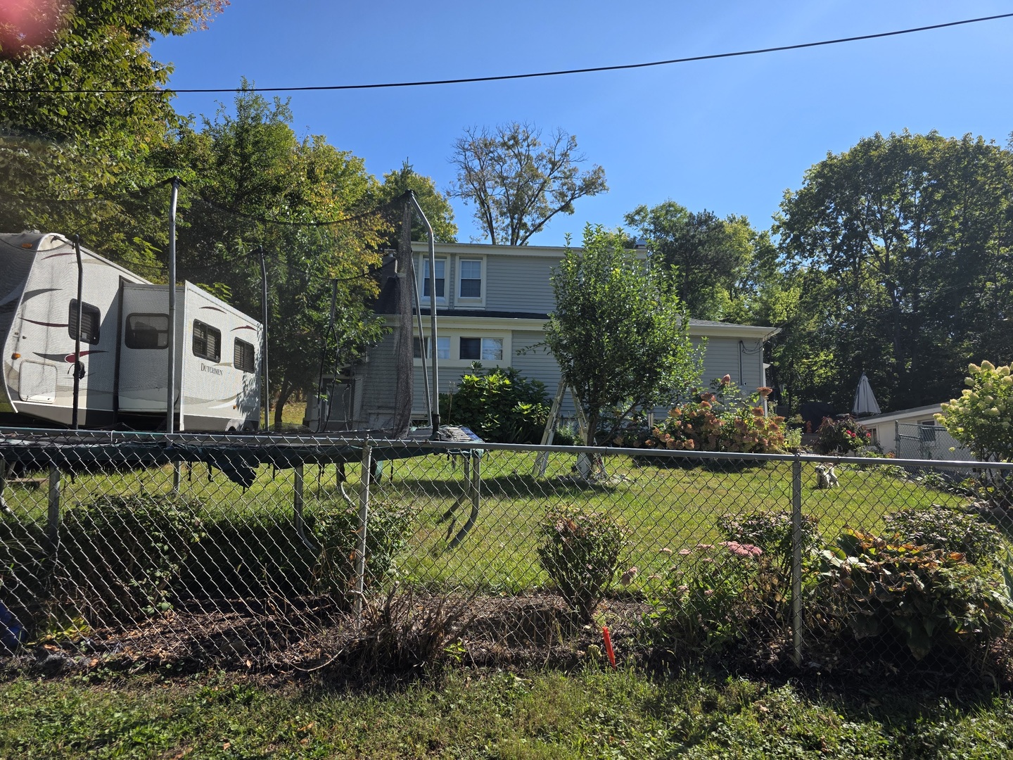 38433 North 5th Avenue Spring Grove, IL 60081 - Photo 42 of 44 a view of a house with a yard and a garden