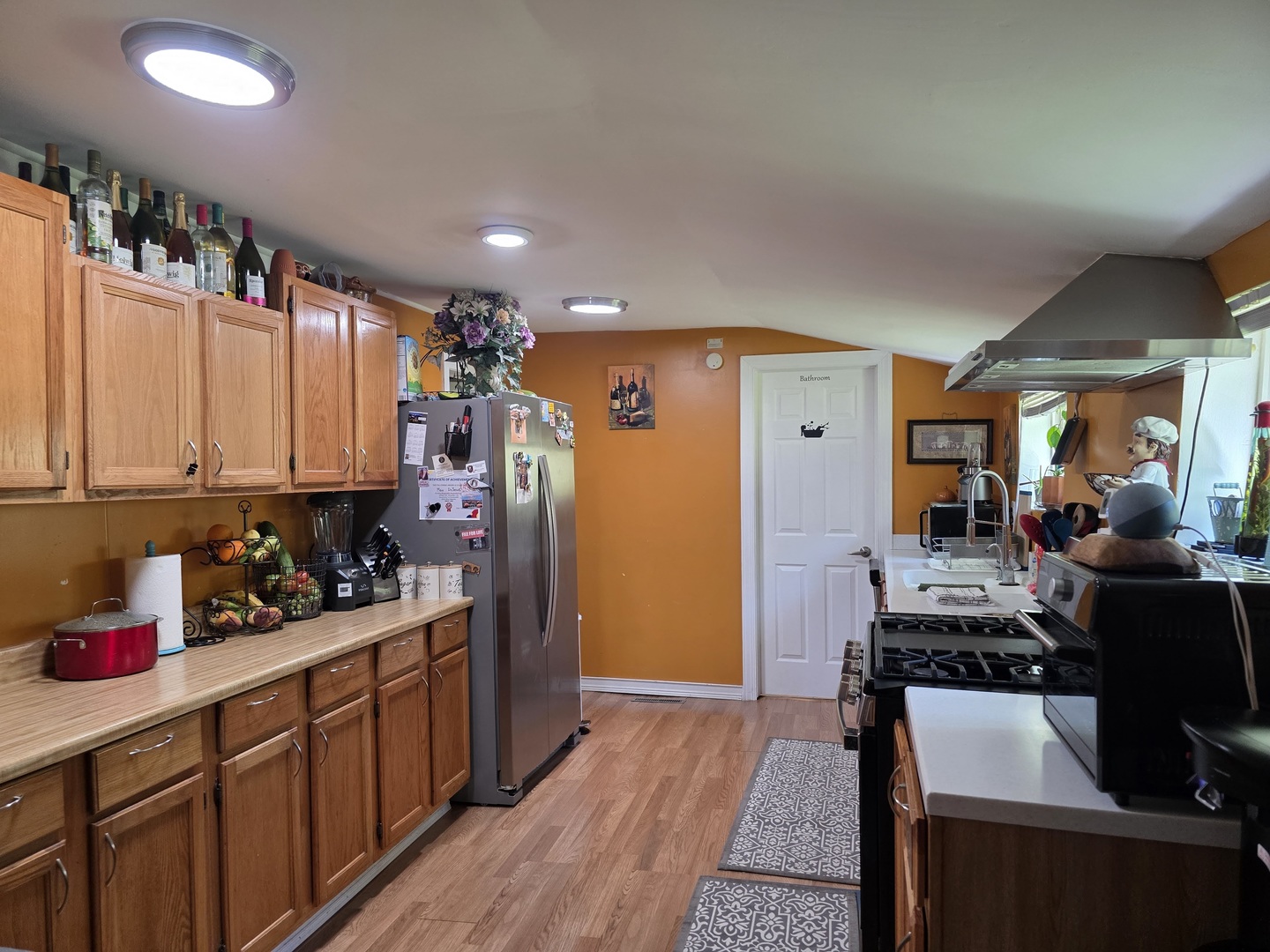 38433 North 5th Avenue Spring Grove, IL 60081 - Photo 10 of 44 a kitchen with refrigerator and cabinets