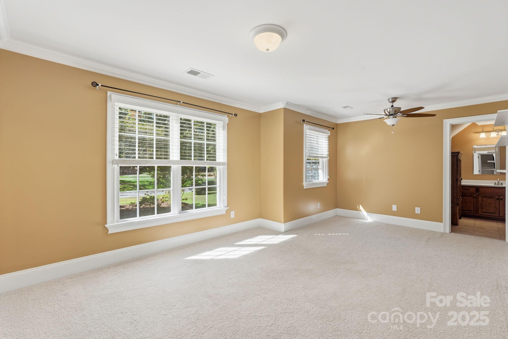 405 St Andrews Road Statesville, NC 28625 - Photo 18 of 37 a view of an empty room with a window