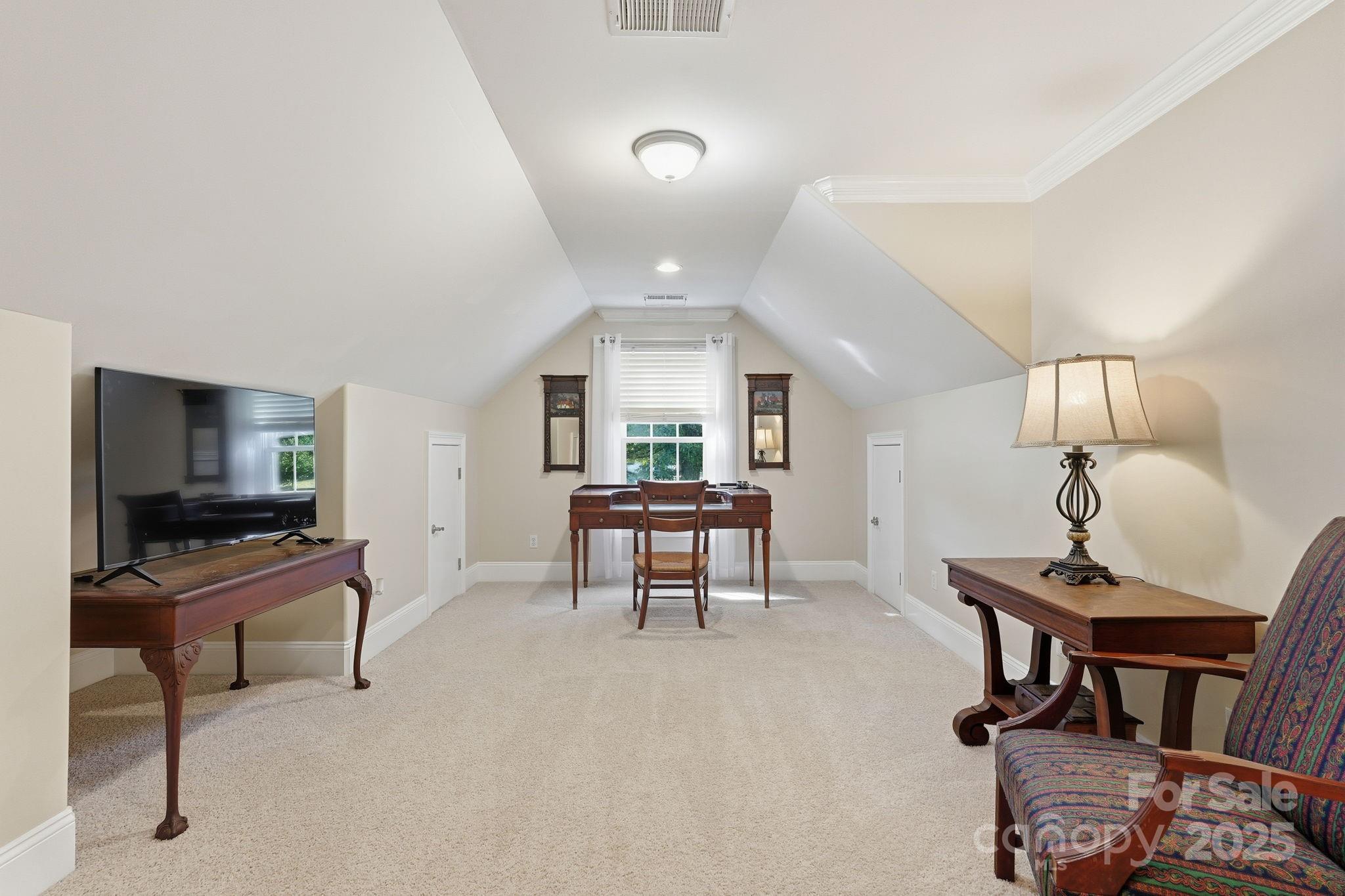 405 St Andrews Road Statesville, NC 28625 - Photo 22 of 37 a living room with furniture a piano and a flat screen tv