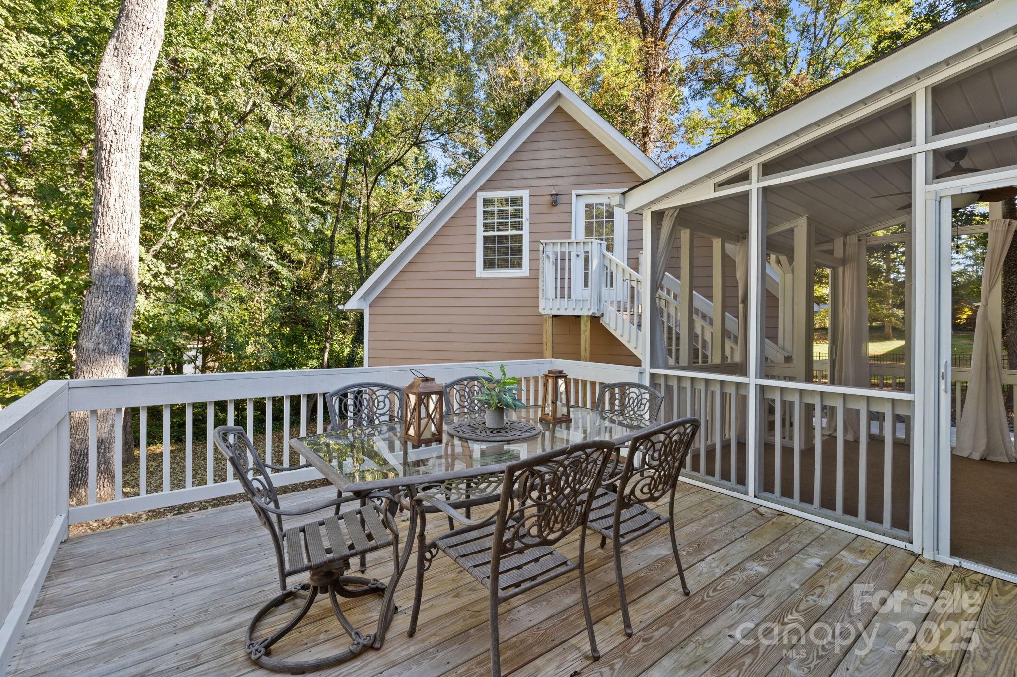 405 St Andrews Road Statesville, NC 28625 - Photo 26 of 37 a view of a chair and table on the deck