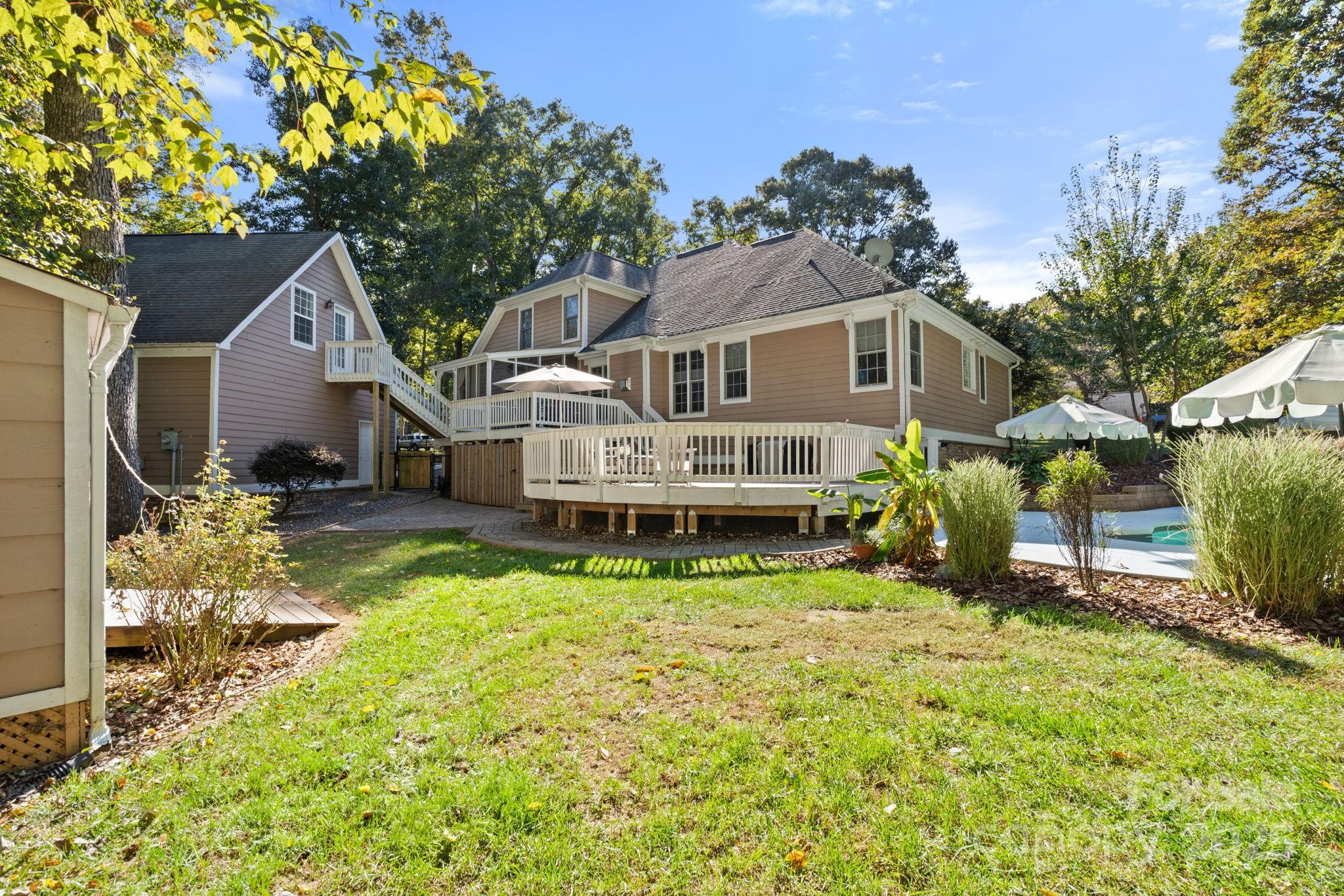 405 St Andrews Road Statesville, NC 28625 - Photo 28 of 37 a view of a house with a big yard and large tree