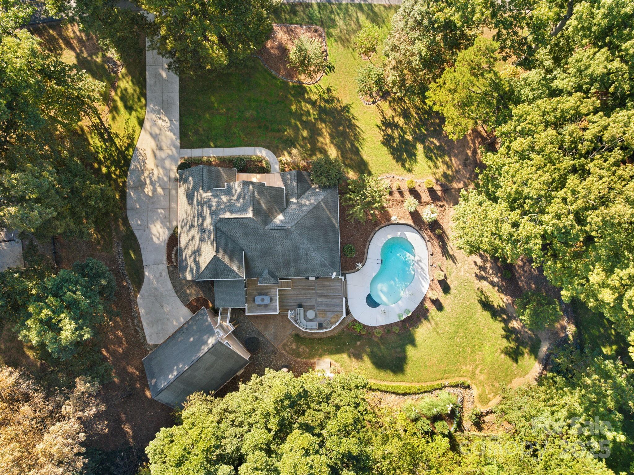 405 St Andrews Road Statesville, NC 28625 - Photo 32 of 37 an aerial view of a backyard with fountain