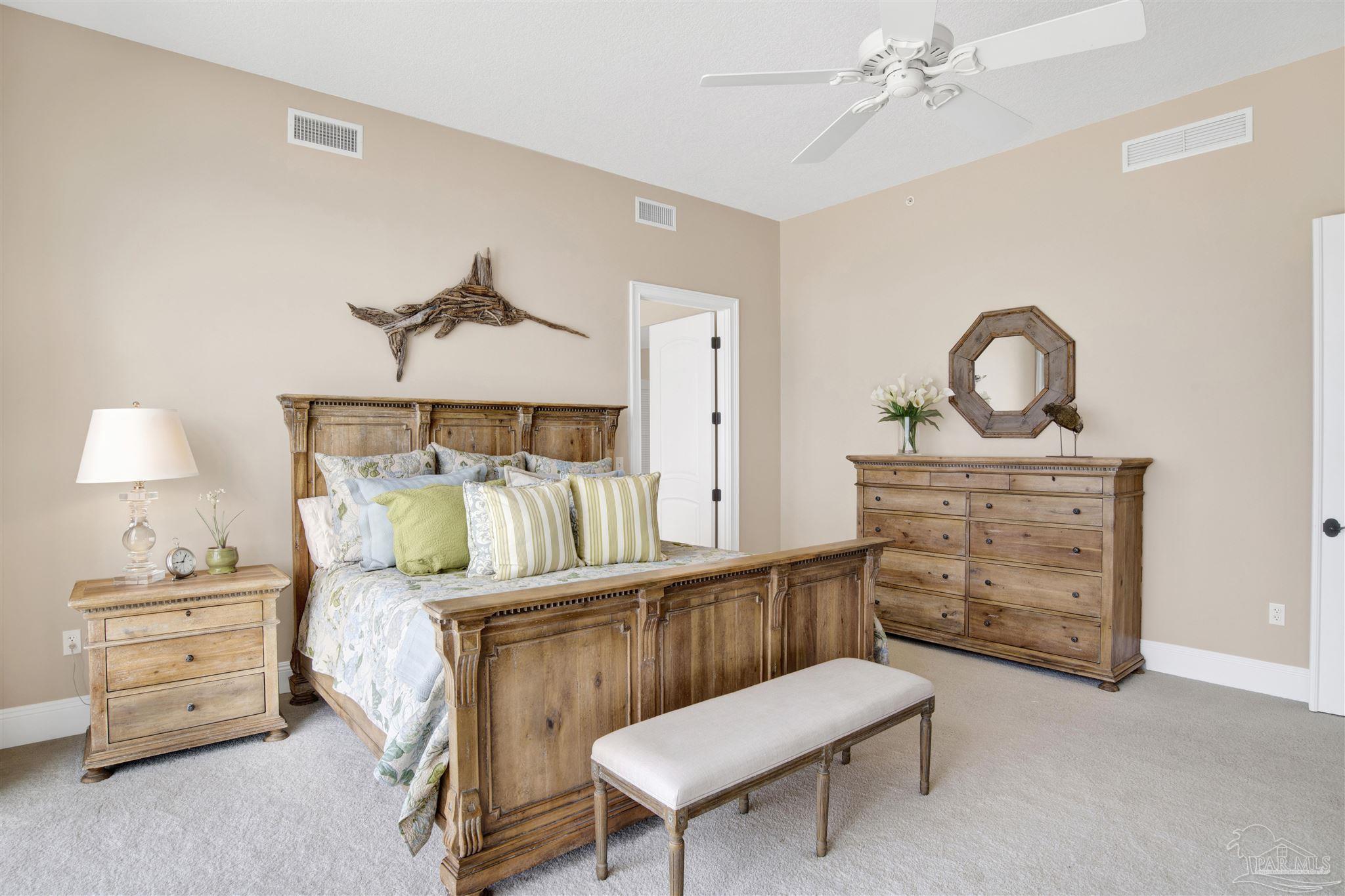 14455 Perdido Key Drive, Unit 601 Perdido Key, FL 32507 - Photo 22 of 62 a bedroom with a bed and a dresser