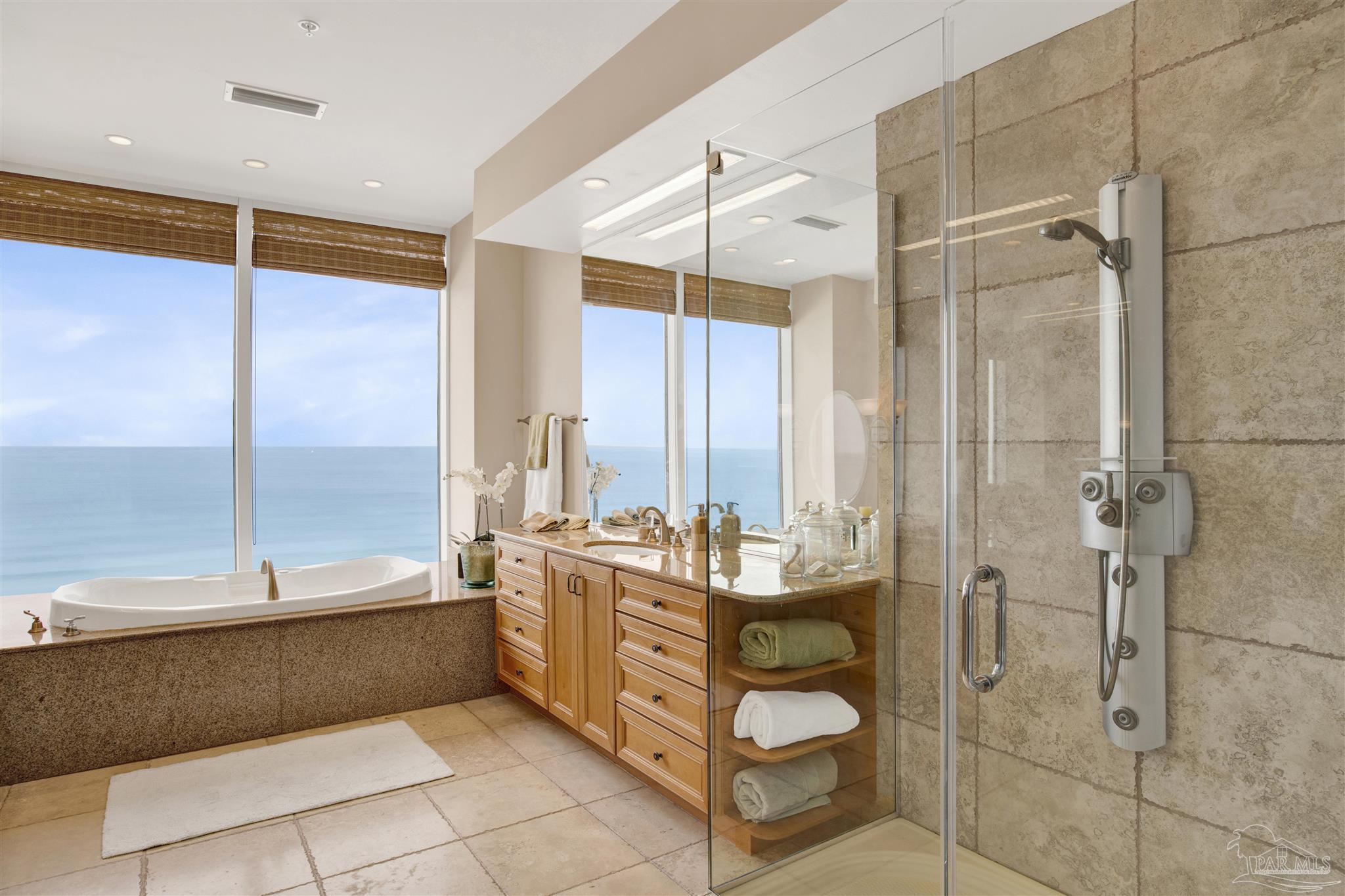 14455 Perdido Key Drive, Unit 601 Perdido Key, FL 32507 - Photo 26 of 62 a bathroom with a bathtub and a shower