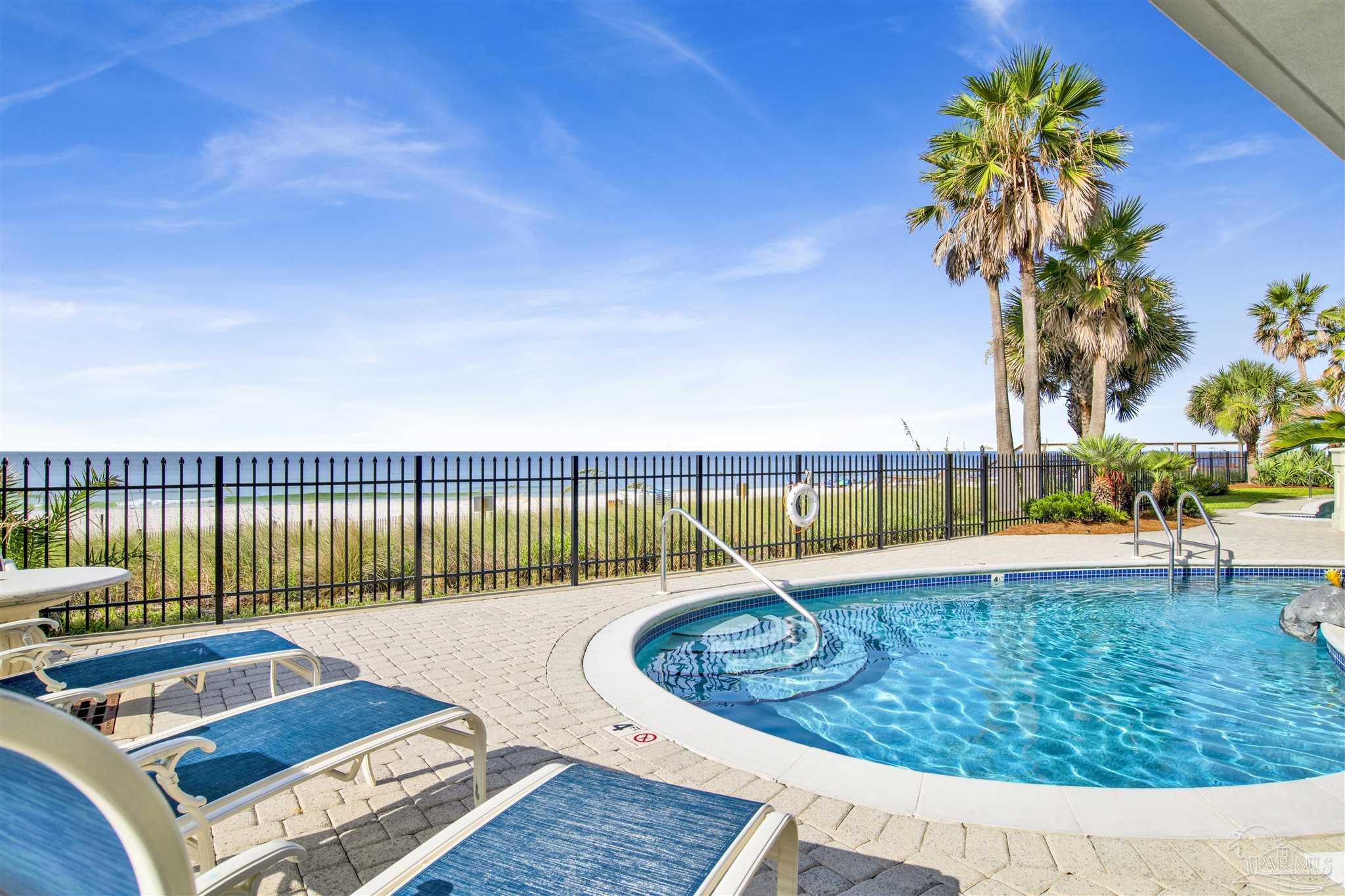 14455 Perdido Key Drive, Unit 601 Perdido Key, FL 32507 - Photo 42 of 62 a view of a swimming pool with a lounge chair