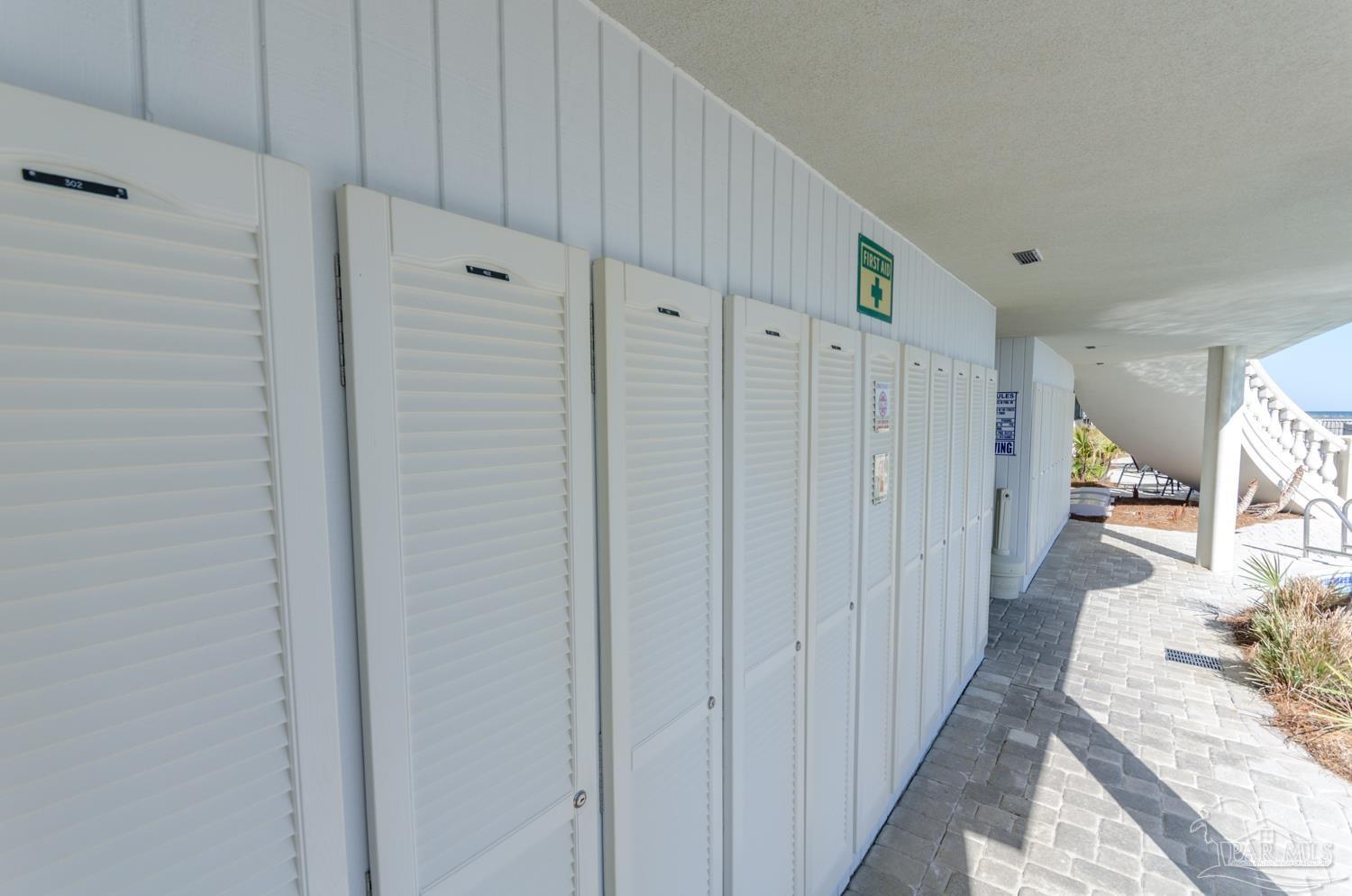 14455 Perdido Key Drive, Unit 601 Perdido Key, FL 32507 - Photo 43 of 62 a view of a hallway with wooden floor closet and entryway