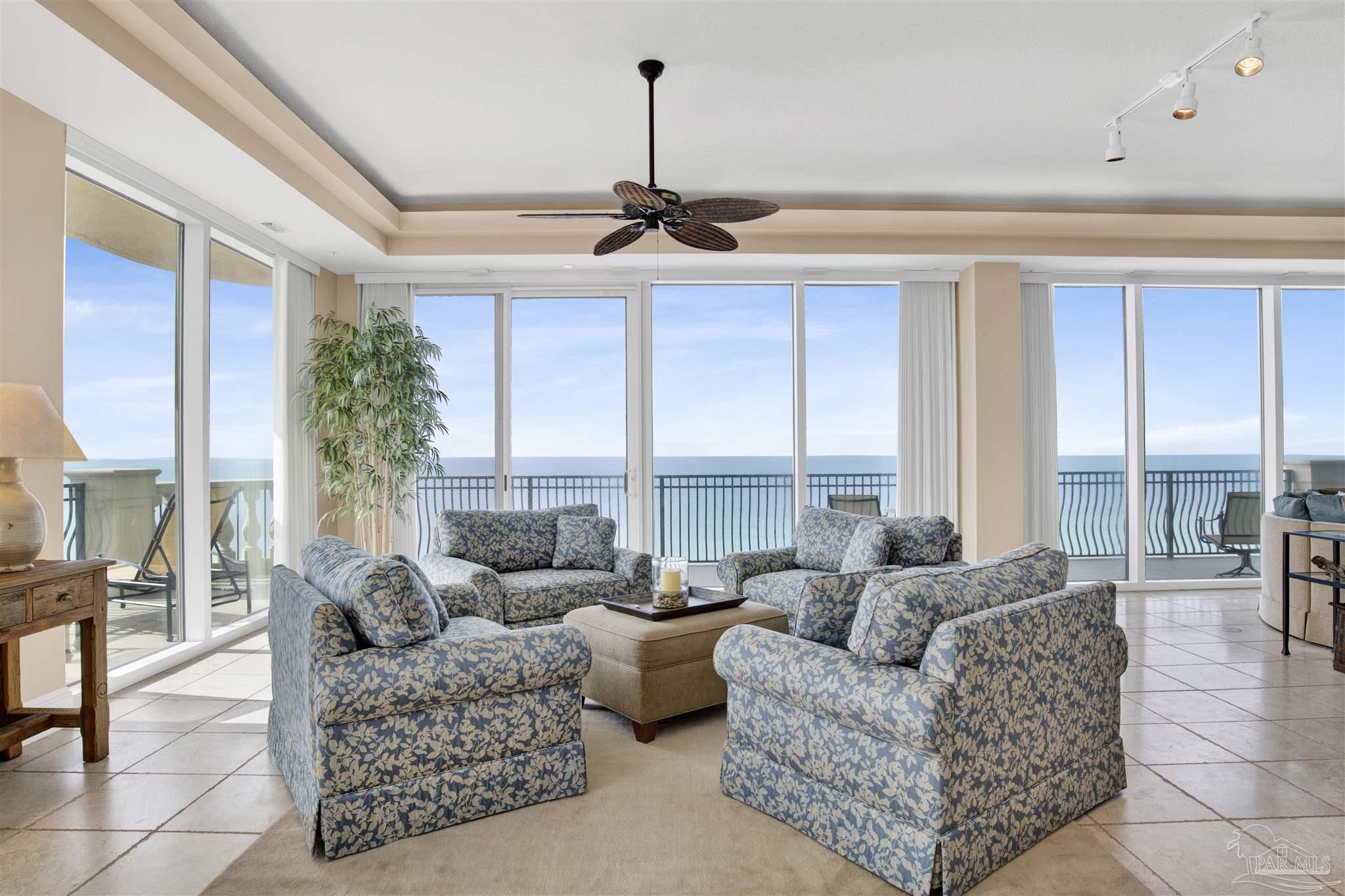 14455 Perdido Key Drive, Unit 601 Perdido Key, FL 32507 - Photo 6 of 62 a living room with furniture and large windows