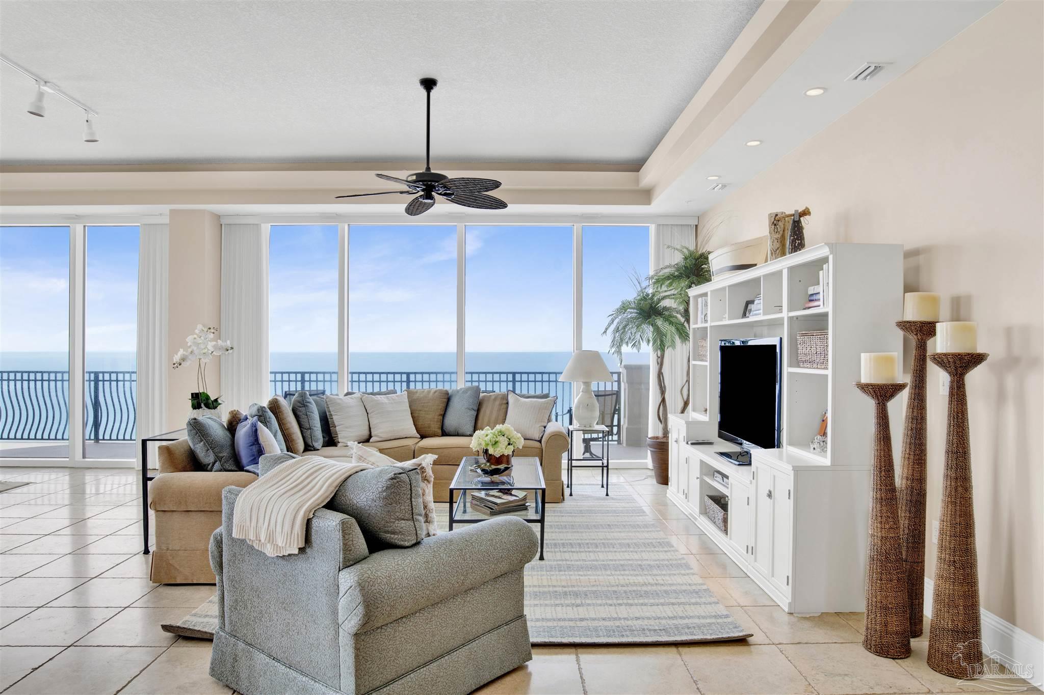 14455 Perdido Key Drive, Unit 601 Perdido Key, FL 32507 - Photo 8 of 62 a living room with furniture and a flat screen tv