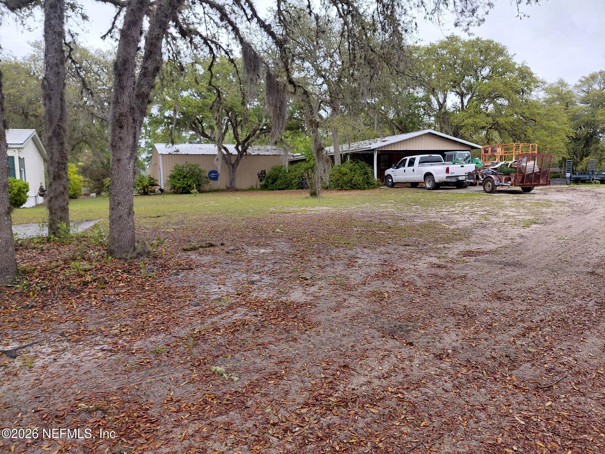 118 Robin Road Pomona Park, FL 32181 - Photo 2 of 40 118 Front 3