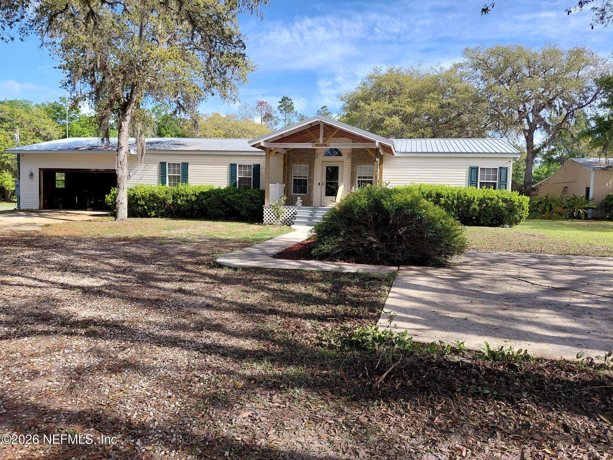 118 Robin Road Pomona Park, FL 32181 - Photo 33 of 40 118 Front of Mobile Home