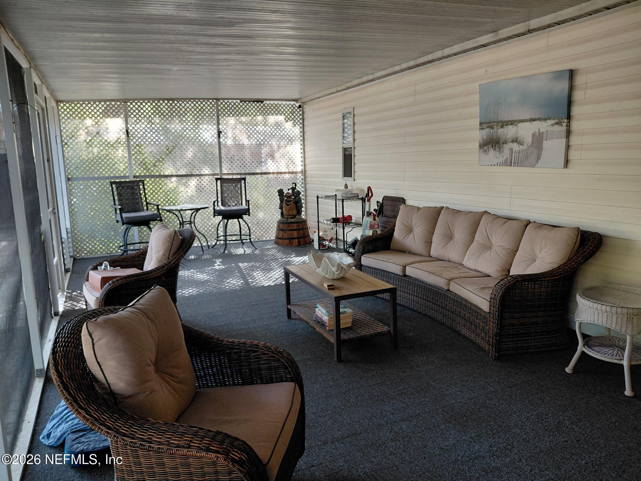 118 Robin Road Pomona Park, FL 32181 - Photo 6 of 40 118 Screen Porch