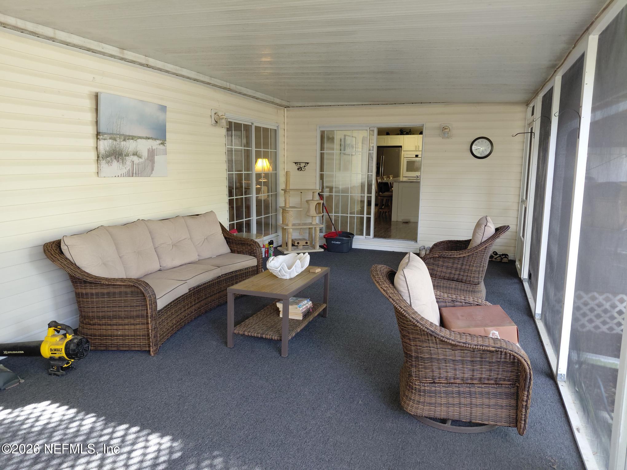 118 Robin Road Pomona Park, FL 32181 - Photo 7 of 40 118 Screen Porch 2