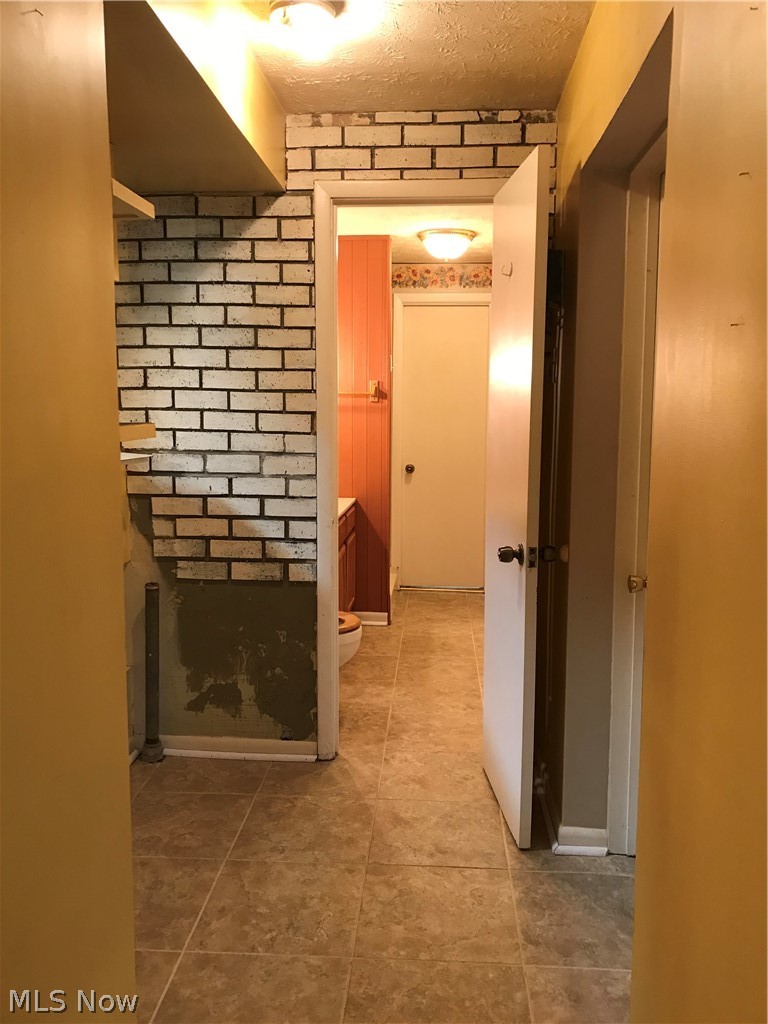 735 Renninger Road Akron, OH 44319 - Photo 13 of 27 Laundry area is to the left