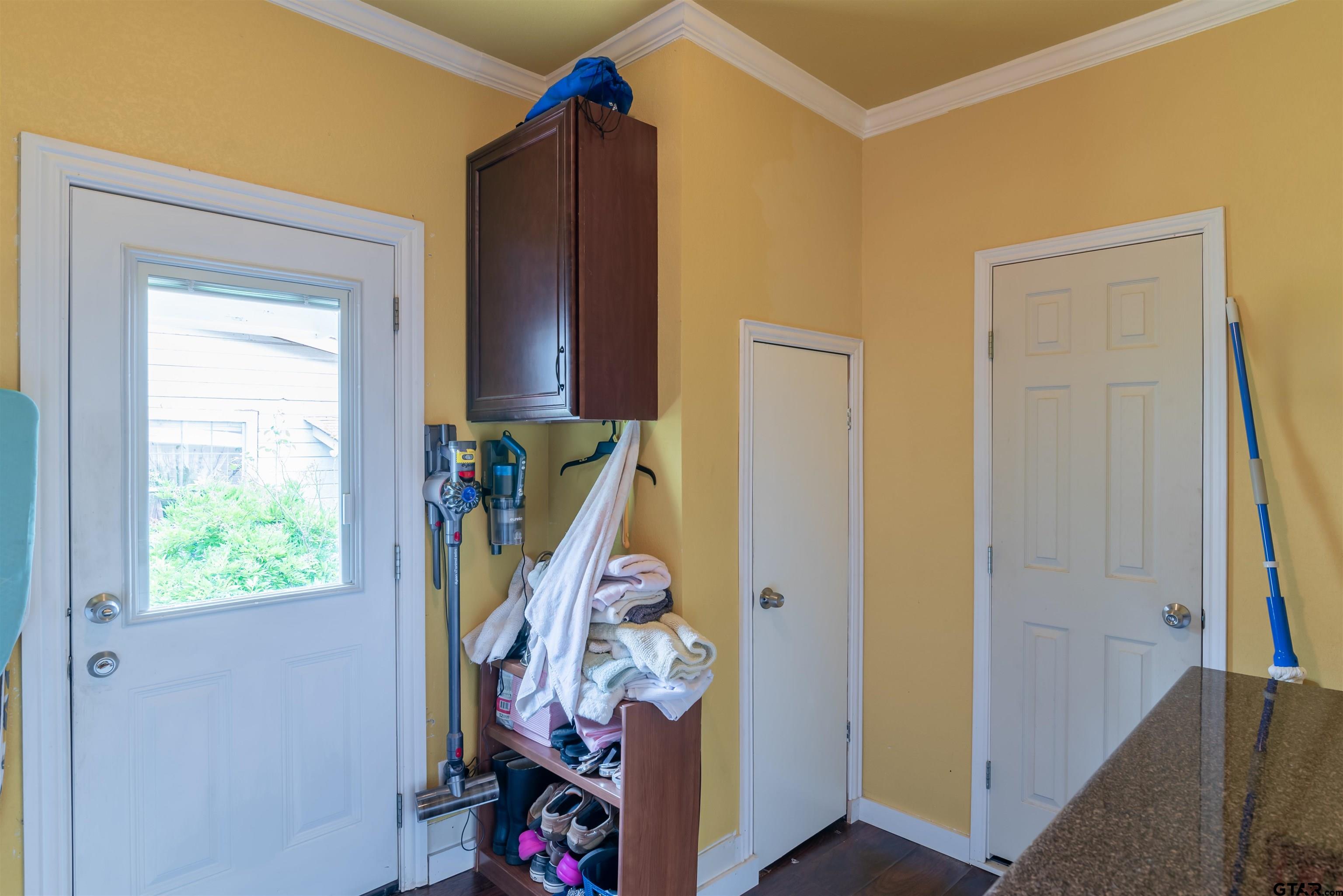 427 East Locust Street Tyler, TX 75702 - Photo 26 of 42 a view of an entryway with wooden floor