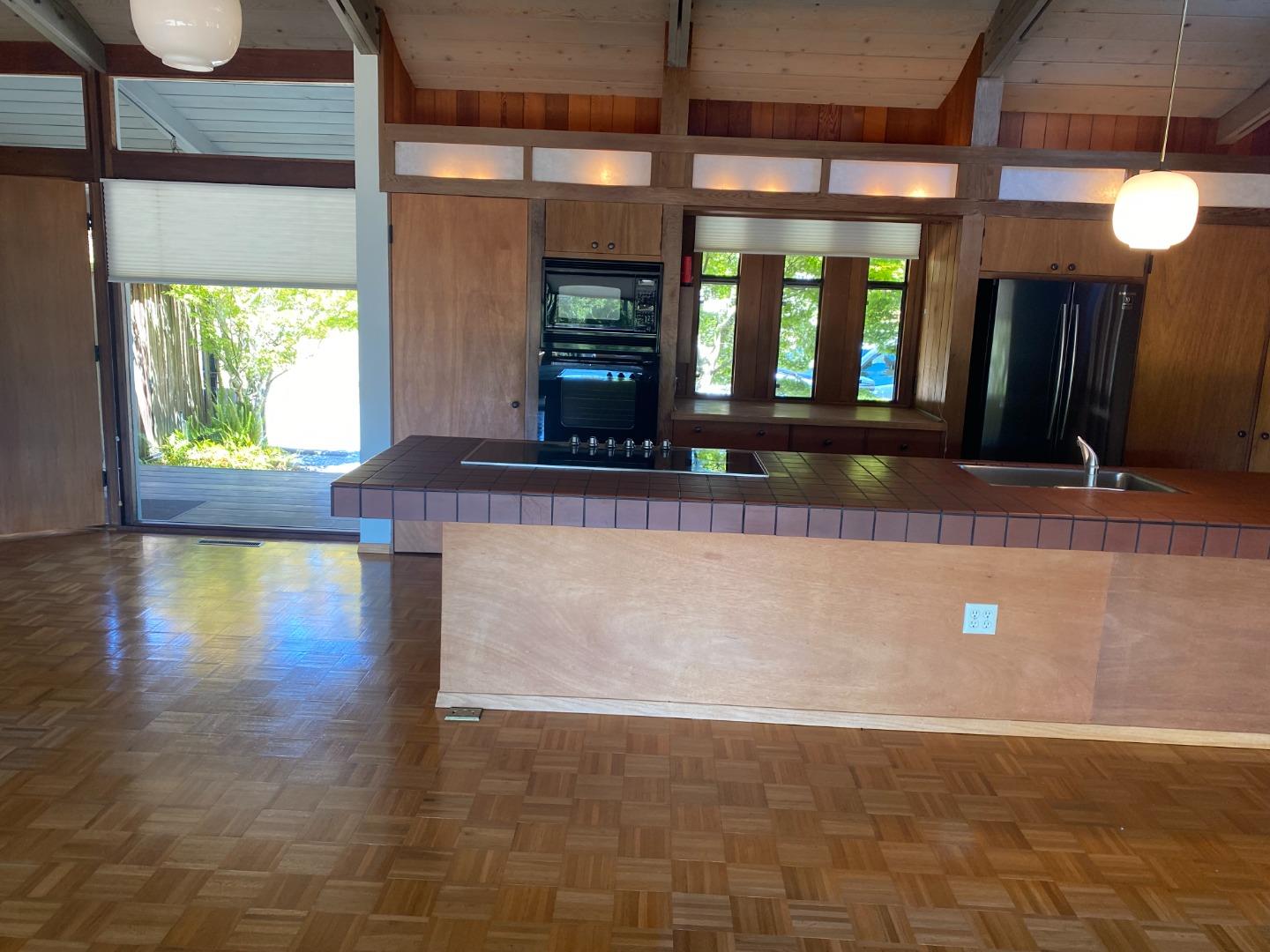 325 Vía Del Rey Monterey, CA 93940 - Photo 7 of 9 a view of lobby with a large window and wooden floor