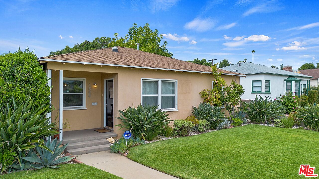 1585 Forest Avenue Pasadena, CA 91103 - Photo 1 of 28 a front view of a house with garden
