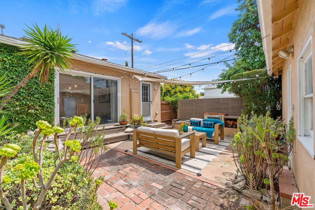 1585 Forest Avenue Pasadena, CA 91103 - Photo 20 of 28 a view of a house with backyard and sitting area