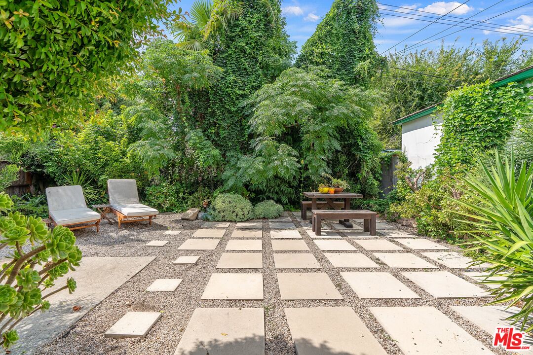 1585 Forest Avenue Pasadena, CA 91103 - Photo 22 of 28 a view of a bench in a backyard