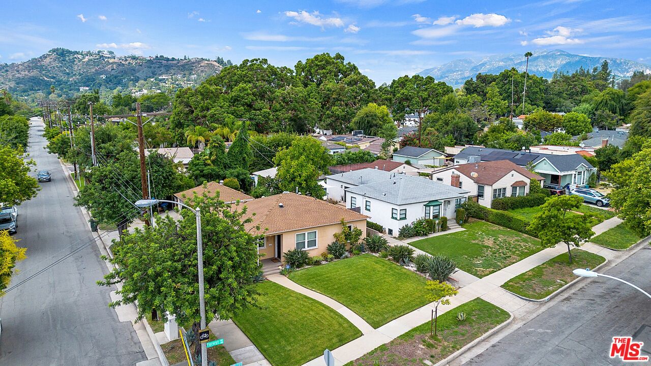 1585 Forest Avenue Pasadena, CA 91103 - Photo 27 of 28 an aerial view of multiple houses with yard