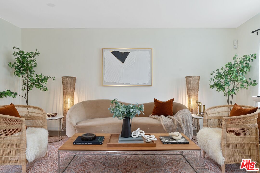 1585 Forest Avenue Pasadena, CA 91103 - Photo 3 of 28 a living room with furniture and a potted plant