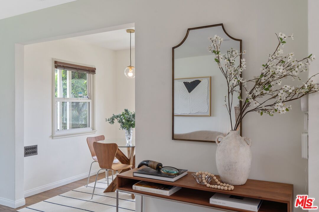 1585 Forest Avenue Pasadena, CA 91103 - Photo 6 of 28 a view of a workspace with furniture and a window