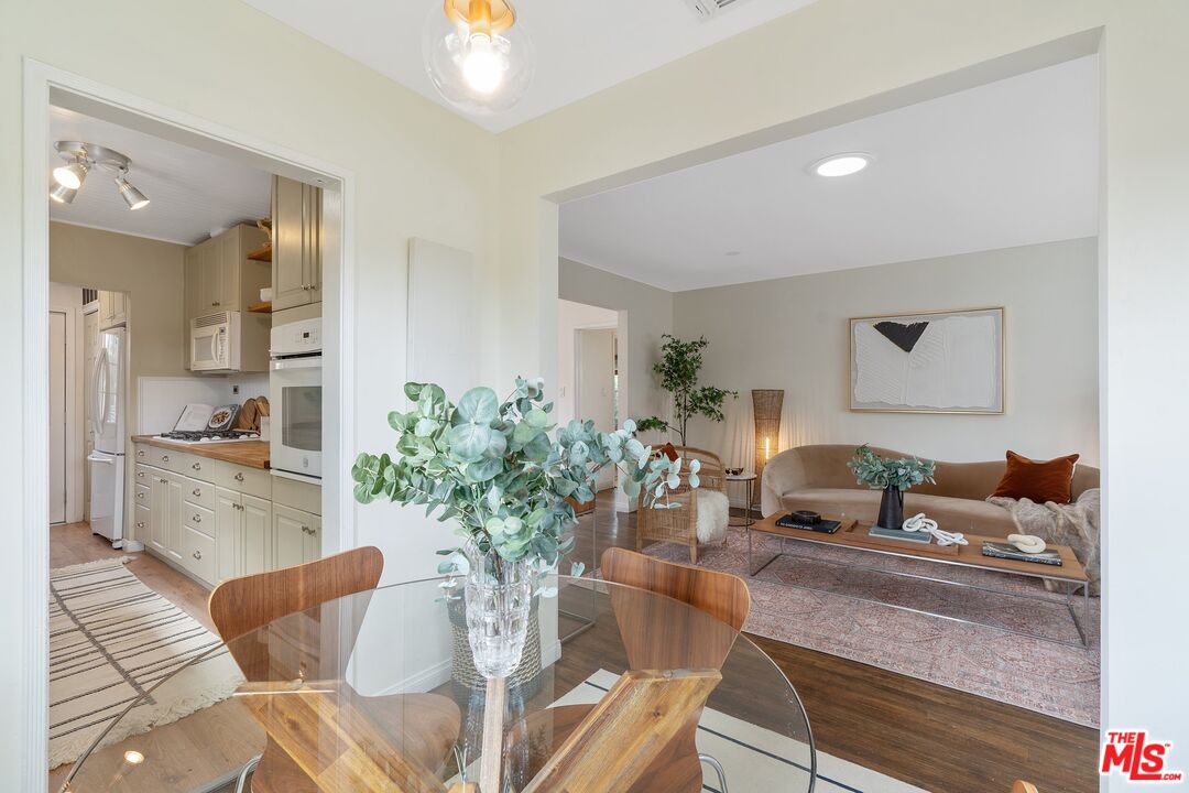 1585 Forest Avenue Pasadena, CA 91103 - Photo 8 of 28 a living room with furniture and a potted plant