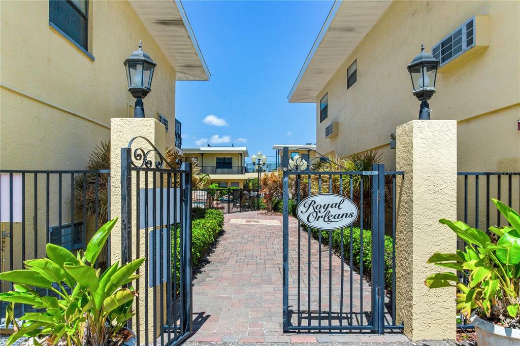 16333 Gulf Boulevard, Unit 113 Redington Beach, FL 33708 - Photo 3 of 40 a view of a street with potted plants