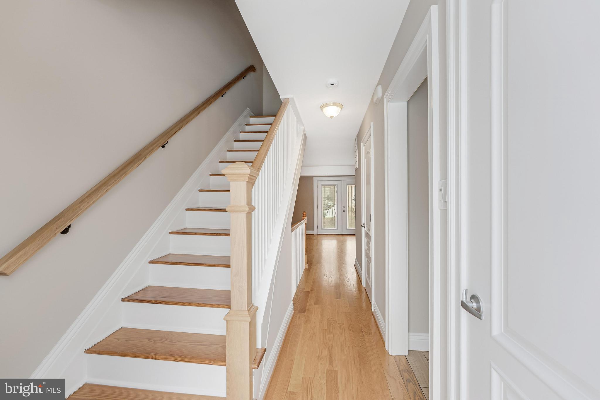 814 Geranium Street Northwest Washington, DC 20012 - Photo 10 of 51 a view of a hallway with wooden floor and entryway