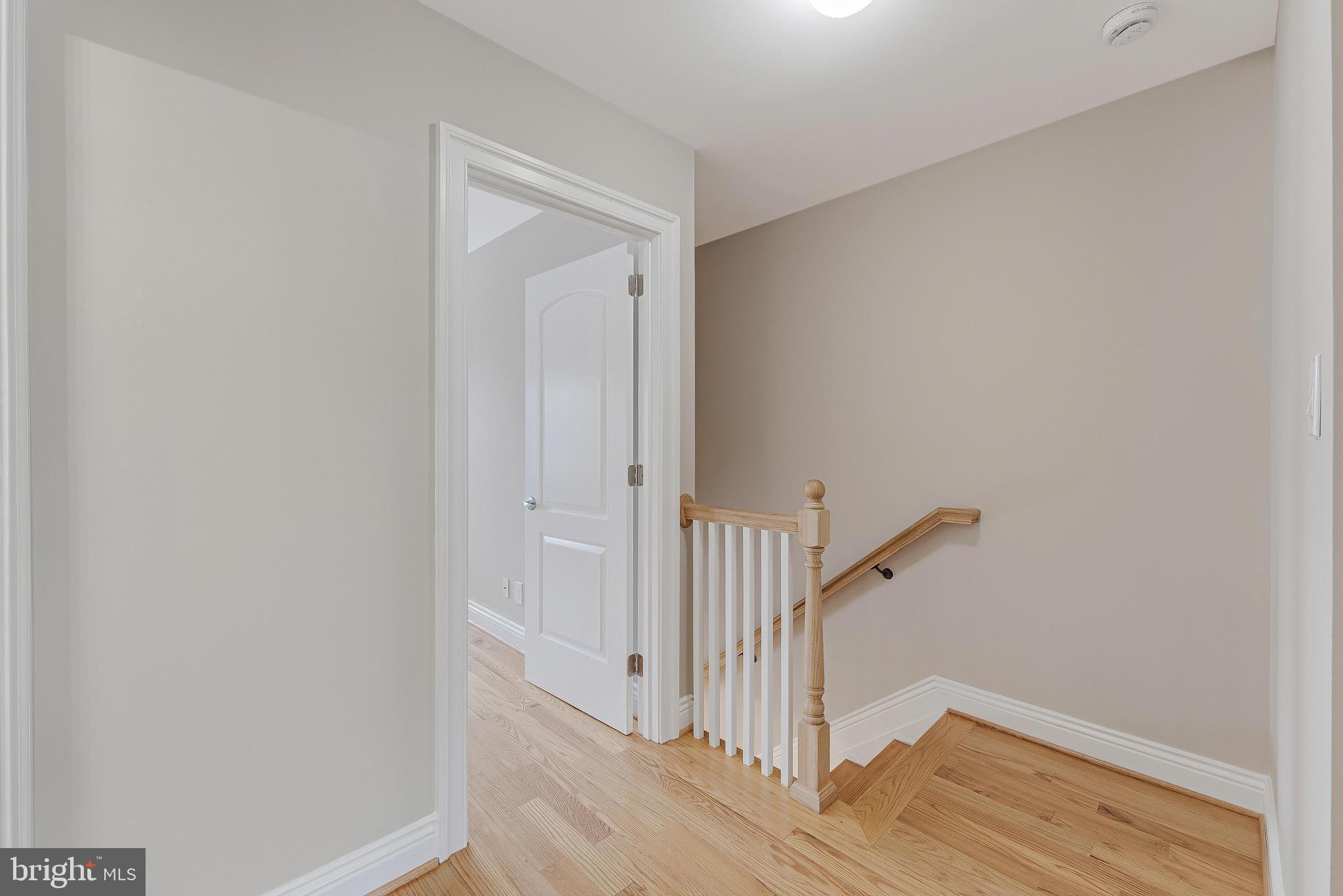 814 Geranium Street Northwest Washington, DC 20012 - Photo 26 of 51 a view of a hallway with wooden floor and entryway