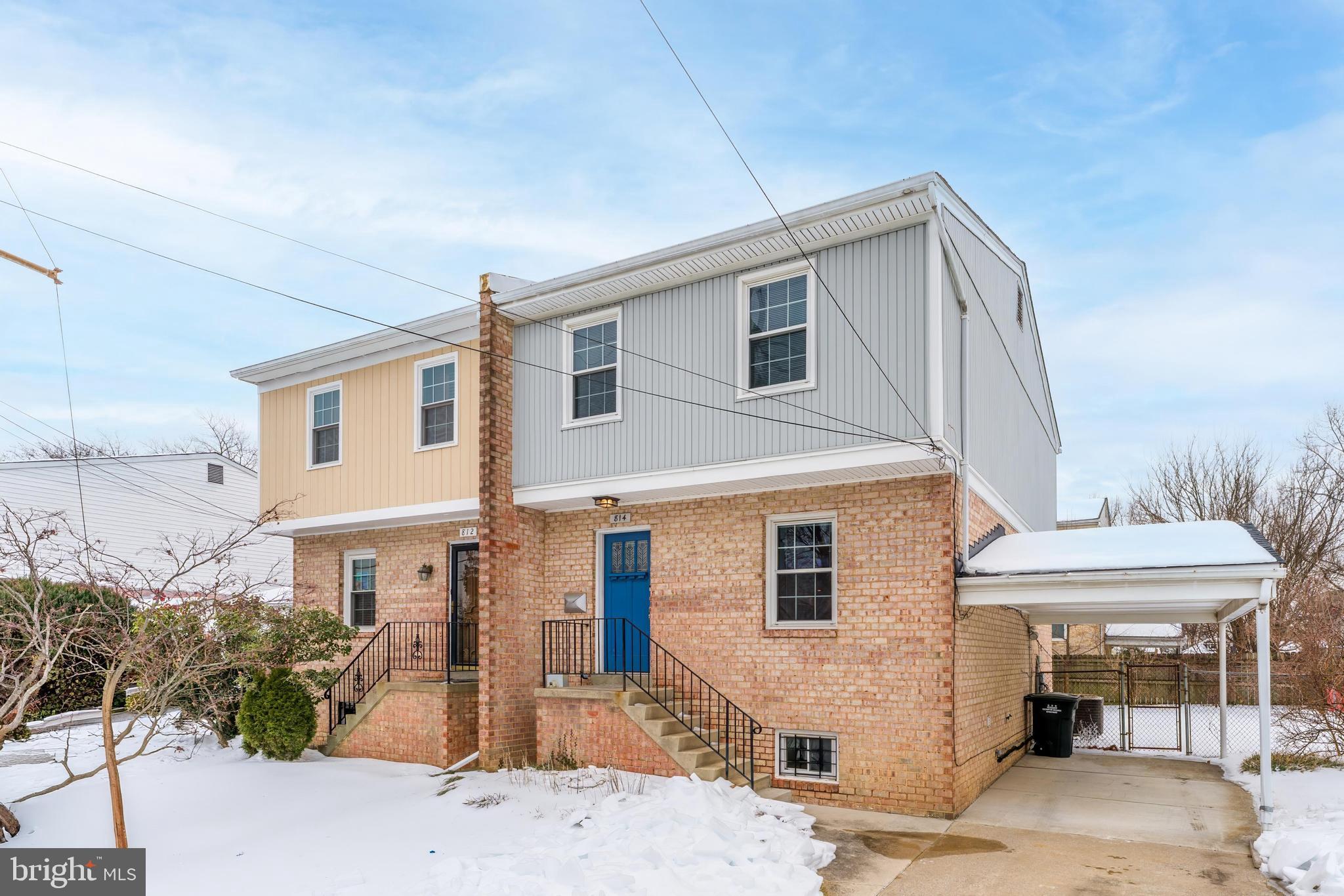 814 Geranium Street Northwest Washington, DC 20012 - Photo 3 of 51 a front view of a house with a yard