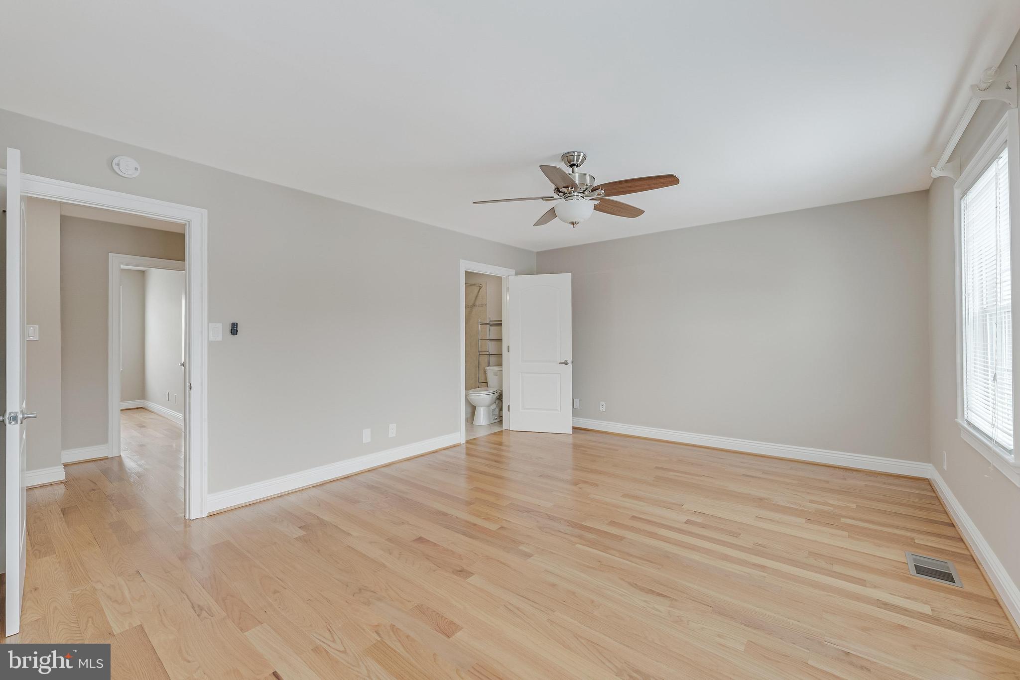 814 Geranium Street Northwest Washington, DC 20012 - Photo 31 of 51 a view of an empty room with wooden floor