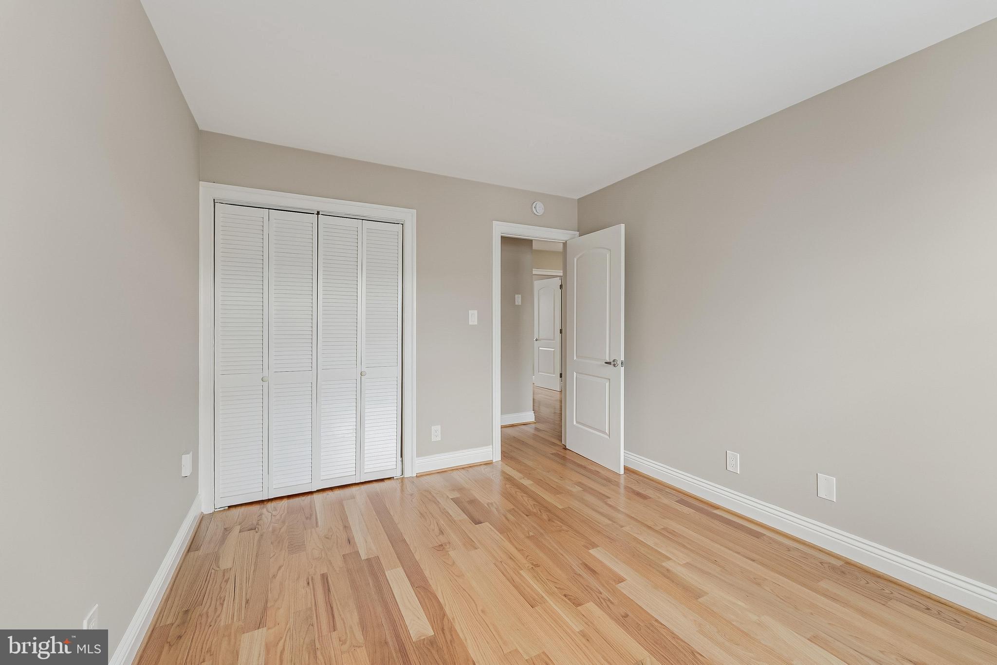814 Geranium Street Northwest Washington, DC 20012 - Photo 33 of 51 a view of an empty room with wooden floor