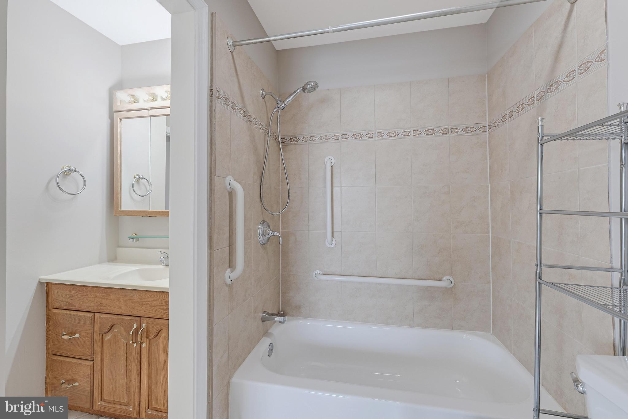 814 Geranium Street Northwest Washington, DC 20012 - Photo 38 of 51 a bathroom with a bathtub and a shower