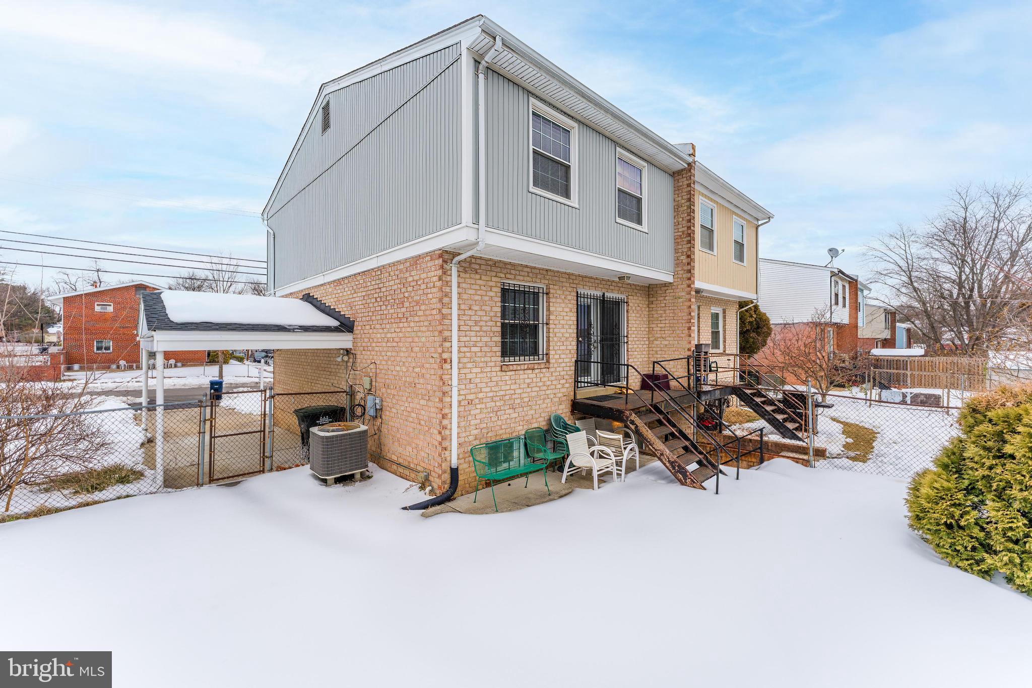 814 Geranium Street Northwest Washington, DC 20012 - Photo 4 of 51 a view of a patio with table and chairs