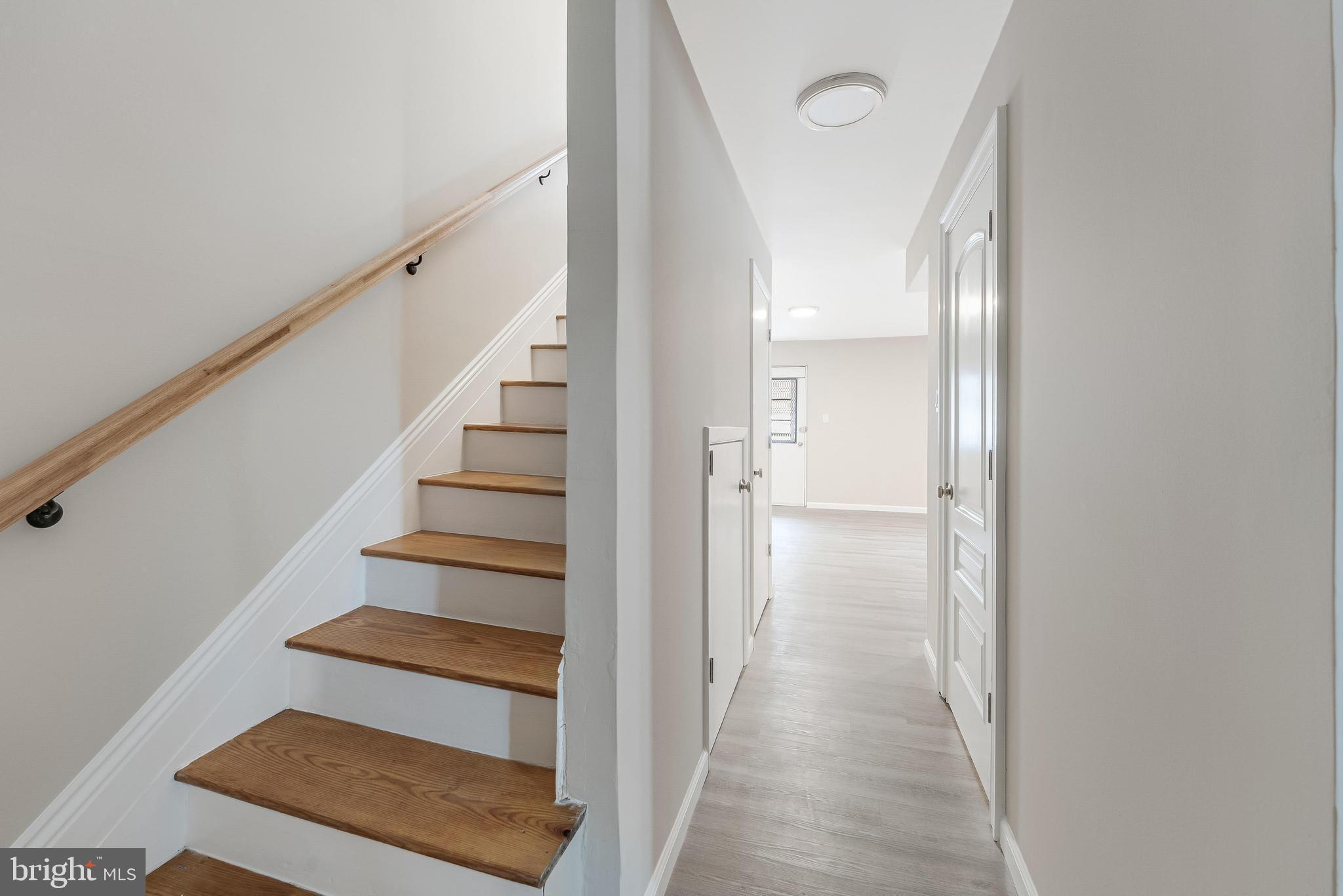 814 Geranium Street Northwest Washington, DC 20012 - Photo 41 of 51 a view of a hallway with wooden floor and entryway