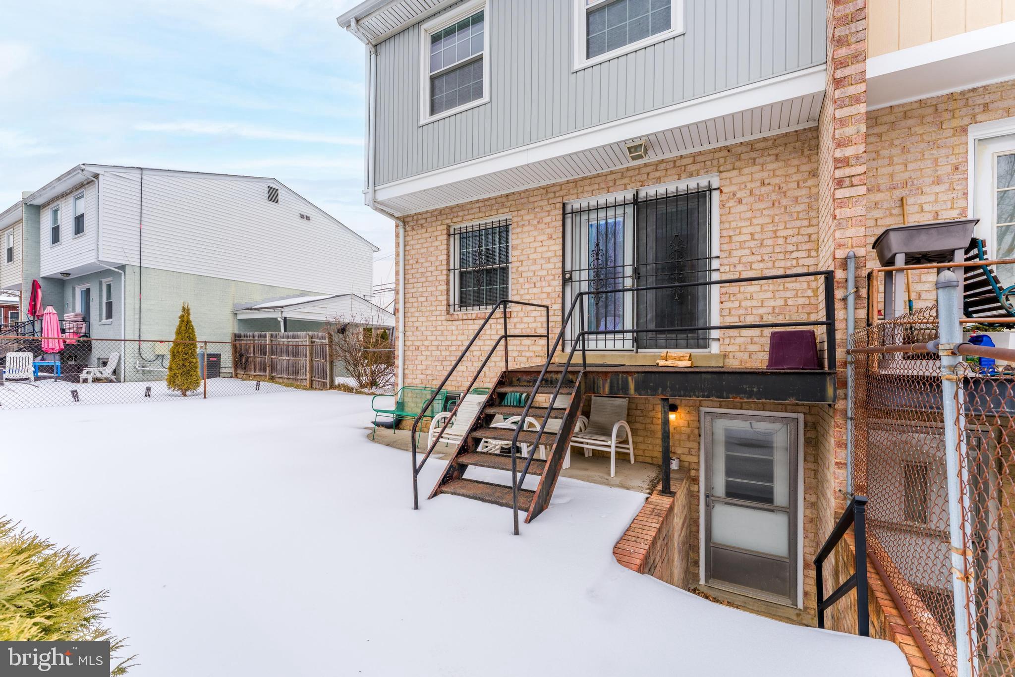 814 Geranium Street Northwest Washington, DC 20012 - Photo 5 of 51 a bedroom with furniture and a large window