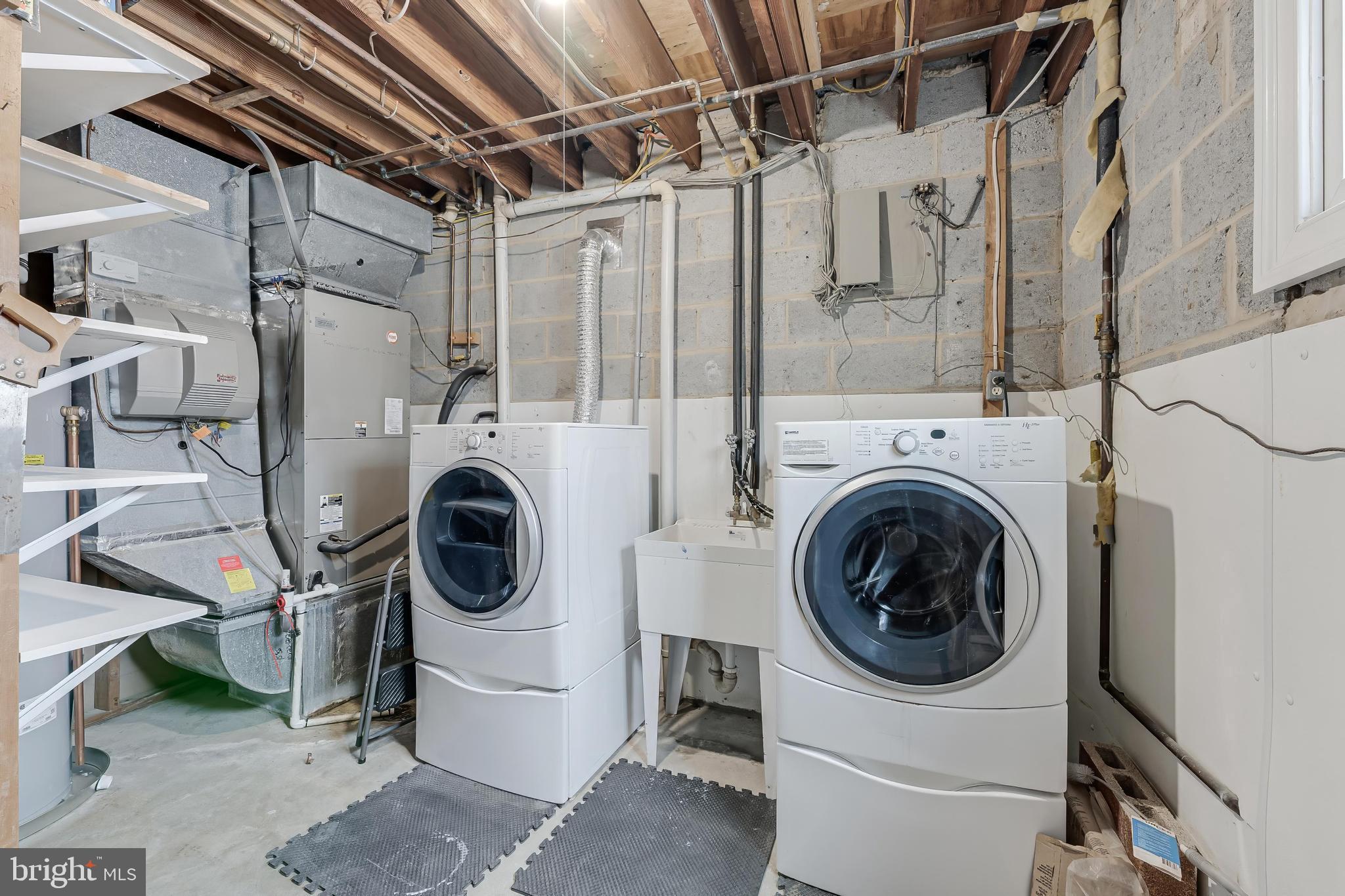 814 Geranium Street Northwest Washington, DC 20012 - Photo 48 of 51 a utility room with dryer and washer