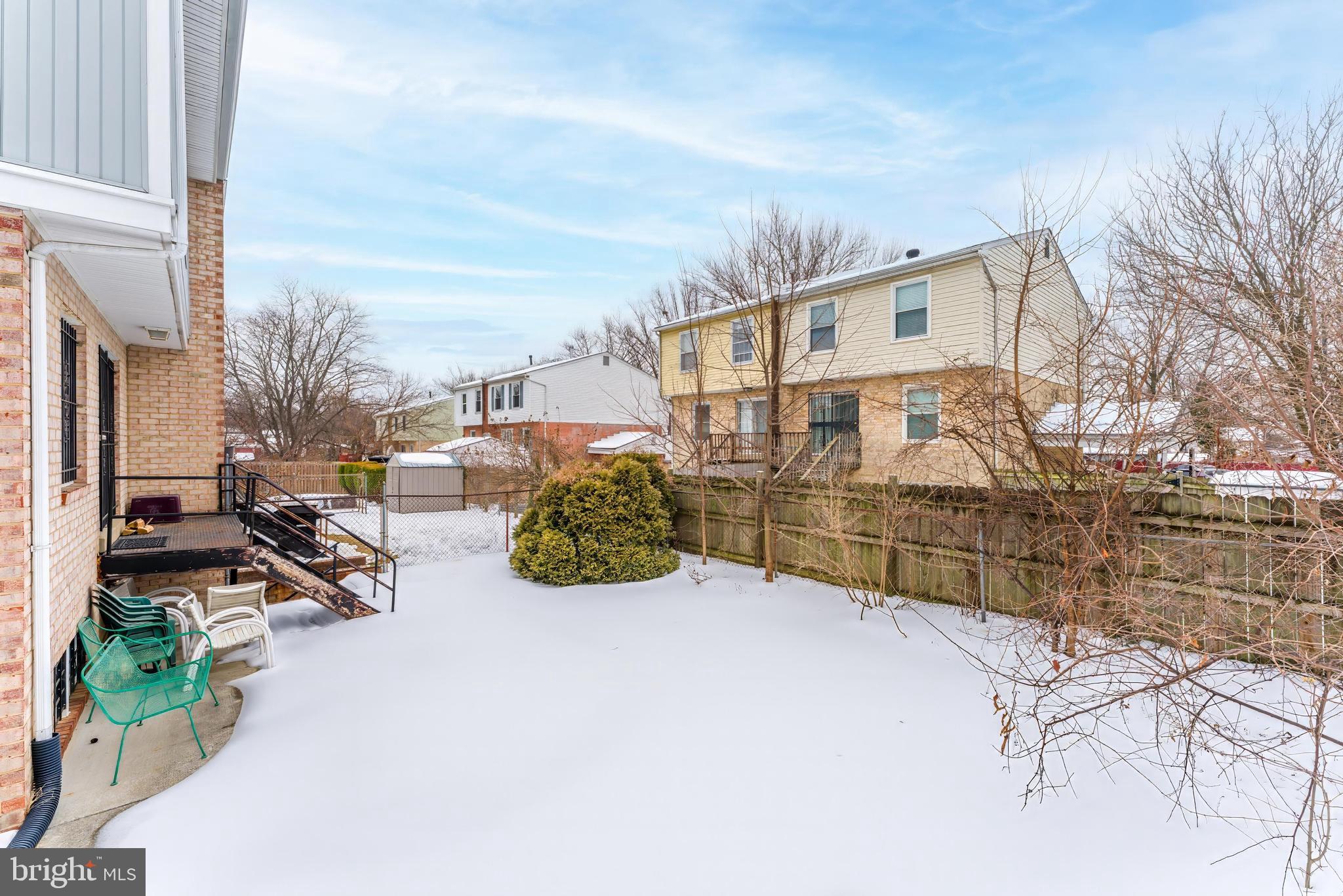814 Geranium Street Northwest Washington, DC 20012 - Photo 7 of 51 a view of a house with wooden fence